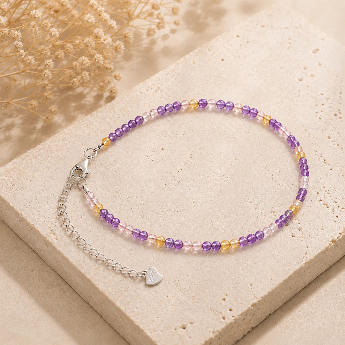 Ametrin Armband mit 925 Silber – Produktansicht auf heller Steinplatte